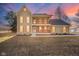 Charming two-story home with a welcoming front porch and beautiful architectural details at 4981 E County Road 200 S, Avon, IN 46123