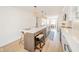 Modern kitchen features a large island, quartz countertops, and stainless steel appliances at 4981 E County Road 200 S, Avon, IN 46123
