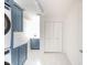 Well-lit laundry room with ample storage and new washer/dryer units at 4981 E County Road 200 S, Avon, IN 46123