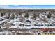 Aerial view of neighborhood showing a house on a tree-lined street at 5053 E Michigan St, Indianapolis, IN 46201