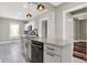 Bright kitchen features an island with granite countertops and stainless steel appliances at 5053 E Michigan St, Indianapolis, IN 46201