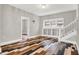 Spacious living area with custom cabinetry and hardwood flooring at 5053 E Michigan St, Indianapolis, IN 46201