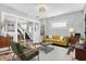 Modern living room with stylish furniture, hardwood floors, and natural light at 5053 E Michigan St, Indianapolis, IN 46201