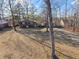 Aerial view of a home surrounded by mature trees on a large lot at 5124 Wexford Rd, Indianapolis, IN 46226
