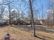 Aerial view of a home surrounded by mature trees on a large lot at 5124 Wexford Rd, Indianapolis, IN 46226
