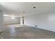 Unfinished basement with painted block walls and concrete flooring awaiting your finishing touches at 5124 Wexford Rd, Indianapolis, IN 46226