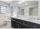 Stylish bathroom features a double sink vanity, and classic fixtures at 5124 Wexford Rd, Indianapolis, IN 46226