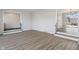 Spacious living room featuring gray walls, modern floors, and an open floor plan, perfect for entertaining at 5124 Wexford Rd, Indianapolis, IN 46226