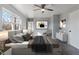 Cozy bedroom with a king-size bed, ensuite bathroom, and soft decor at 5124 Wexford Rd, Indianapolis, IN 46226