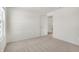 Bright bedroom features neutral carpet and a door leading to other rooms at 5648 Juniper Ct, Whitestown, IN 46075