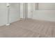 Bedroom featuring neutral carpet, white walls, and simple decor and lighting at 5648 Juniper Ct, Whitestown, IN 46075
