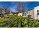 Landscaped backyard featuring a storage shed and gravel accents at 5757 E 21St St, Indianapolis, IN 46218