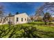 A charming, well-maintained home with a lush lawn and a classic suburban aesthetic at 5757 E 21St St, Indianapolis, IN 46218