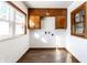Bonus room offers built in cabinets, new vinyl flooring, and lots of natural light at 5757 E 21St St, Indianapolis, IN 46218