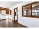 Bonus room with dark cabinets and vinyl floors located off the kitchen at 5757 E 21St St, Indianapolis, IN 46218