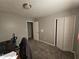 Bedroom view highlighting access to the closet and a second doorway at 5816 Coppock Ln, Indianapolis, IN 46221