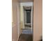 Hallway with neutral walls and carpet leading to other rooms at 5816 Coppock Ln, Indianapolis, IN 46221