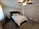 Main bedroom featuring a ceiling fan and neutral paint at 5816 Coppock Ln, Indianapolis, IN 46221