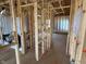 Bathroom framing with visible plumbing and electrical, offering a glimpse into the under-construction setup at 618 Firefly Ct, Greenfield, IN 46140