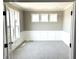Cozy office space with wainscoting, carpet, and natural light from the windows at 618 Firefly Ct, Greenfield, IN 46140