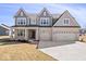 Beautiful two-story home with a brick and siding exterior at 6723 Collisi Pl, Brownsburg, IN 46112