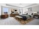 Main bedroom featuring tray ceilings, light walls, and large windows for natural light at 6723 Collisi Pl, Brownsburg, IN 46112