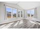 Bright sunroom with vaulted ceilings and many large windows at 6723 Collisi Pl, Brownsburg, IN 46112