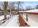 Spacious wooden backyard deck bordered by a brown wooden fence, ready for outdoor entertaining at 6907 Buick Dr, Indianapolis, IN 46214