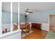 Inviting dining room with a classic wooden table, chairs, and a stylish sideboard, perfect for Gathering gatherings and dinner parties at 6907 Buick Dr, Indianapolis, IN 46214