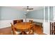 Comfortable dining area showcasing a round table, cushioned seating, and elegant wooden furniture, ideal for gatherings and Gathering time at 6907 Buick Dr, Indianapolis, IN 46214