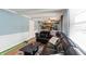 Inviting living space featuring comfortable seating, a view into the adjacent kitchen, and a cozy atmosphere for relaxation at 6907 Buick Dr, Indianapolis, IN 46214