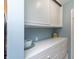 Built-in storage with a pull-down door and drawers provides organized and efficient space at 6907 Buick Dr, Indianapolis, IN 46214