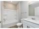 Clean, well-lit bathroom featuring a shower-tub combo, toilet, and vanity with sink at 7026 Barrett Dr, Brownsburg, IN 46075