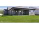 Home exterior with siding and a covered porch overlooks a spacious, well-maintained lawn at 7038 Barrett Dr, Brownsburg, IN 46112