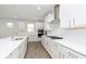 Beautiful white kitchen featuring stainless steel appliances, subway tile backsplash and center island at 7038 Barrett Dr, Brownsburg, IN 46112