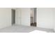 Bright bedroom features plush carpet, and access to an ensuite bathroom at 7197 Barrett Dr, Brownsburg, IN 46112