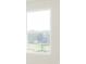 This window offers an exterior view of the surrounding landscape at 7197 Barrett Dr, Brownsburg, IN 46112