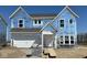 New two-story home featuring an attached two-car garage with professional building materials in a suburban neighborhood at 750 Oakleaf Dr, Greenfield, IN 46140