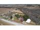 An aerial view of a charming single Gathering home nestled among trees and open fields at 11131 N State Road 9, Fountaintown, IN 46130