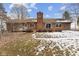 View of backyard features a deck, brick exterior, and partial fencing at 11131 N State Road 9, Fountaintown, IN 46130