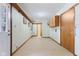 Unfinished basement area with access to utilities and a door leading to the exterior at 11131 N State Road 9, Fountaintown, IN 46130