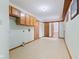Unfinished basement area with built-in storage and access to utilities at 11131 N State Road 9, Fountaintown, IN 46130
