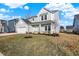 Two-story home with a gray exterior, two-car garage, and landscaped front yard at 19763 Atwater Ave, Sheridan, IN 46069