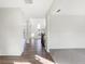 Spacious hallway connects different areas of the home, with a view of the staircase and large windows at 19763 Atwater Ave, Sheridan, IN 46069