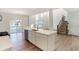Spacious kitchen featuring an island with a sink, stainless steel appliances and a view of the stairs at 19763 Atwater Ave, Sheridan, IN 46069