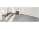 Bright living room featuring neutral tones, plush carpeting, and hardwood flooring at 19763 Atwater Ave, Sheridan, IN 46069