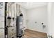 Utility room includes a water heater and furnace, with washer/dryer hookups at 19763 Atwater Ave, Sheridan, IN 46069