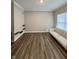 Inviting living room with hardwood floors, neutral walls, and plenty of natural light at 1986 Mccormick Dr, Greenwood, IN 46143