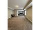 Expansive main bedroom boasts neutral tones, tray ceilings, and ample natural light from several windows at 1986 Mccormick Dr, Greenwood, IN 46143