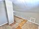 Attic nook featuring hardwood floors and white-painted walls at 210 S West St, Paragon, IN 46166